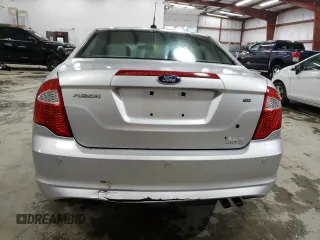 2012 Ford Fusion SE z VIN 3FAHP0HA5CR371175, wystawiony jako Copart lot #52073675 z przebiegiem 135 813 mil mil oraz Czysty tytuł • Clean title. Historia ofert i sprzedaży dostępna na DreamBid. Obrazek 6.