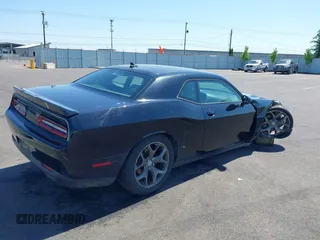 2015 Dodge Challenger SXT Plus with VIN 2C3CDZBGXFH770568, listed as a IAAI auction lot 42164555 with 108,889 mi miles and . Bid and sale history available at DreamBid. Image 4.