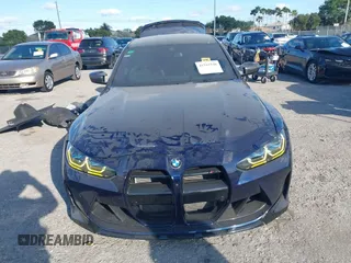 2023 BMW M3 Competition xDrive z VIN WBS43AY07PFP49042, wystawiony jako IAAI lot #41515546 z przebiegiem 10 406 mil mil oraz . Historia ofert i sprzedaży dostępna na DreamBid. Obrazek 13.