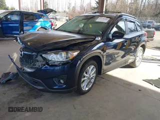 2014 Mazda CX-5 Grand Touring with VIN JM3KE2DY6E0394172, listed as a IAAI auction lot 41698468 with 89,554 mi miles. Bid and sale history available at carsss.com. Image 2.