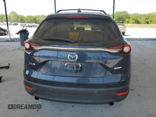 2021 Mazda CX-9 Touring with VIN JM3TCACY7M0528188, listed as a Copart auction lot 53880865 with 63,581 mi miles and Salvage title. Bid and sale history available at DreamBid. Image 6.