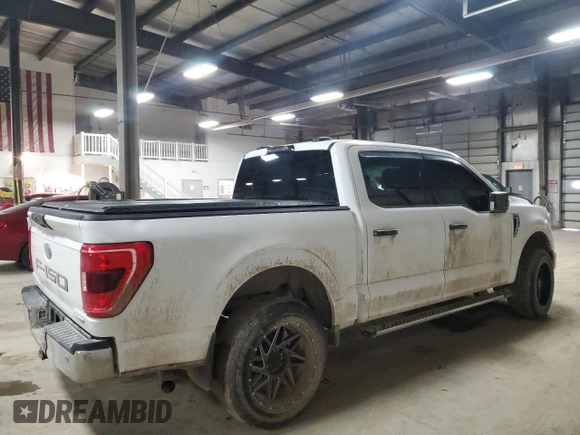 2021 Ford F-150 XL with VIN 1FTFW1E8XMFA35161, listed as a Copart auction lot 41602005 with 54,519 mi miles and Salvage Title. Bid and sale history available at carsss.com. Image 3.