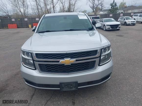 2015 Chevrolet Tahoe Commercial with VIN 1GNSK2ECXFR681555, listed as a IAAI auction lot 41975359 with 126,785 mi miles. Bid and sale history available at carsss.com. Image 12.