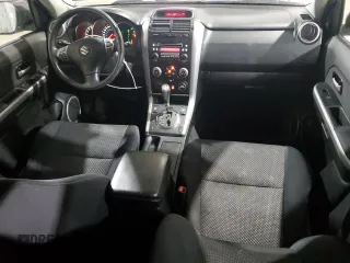 2006 Suzuki Grand Vitara Premium z VIN JS3TD943164103120, wystawiony jako Copart lot #56132585 z przebiegiem 143 313 mil mil oraz Szkoda całkowita • Salvage title. Historia ofert i sprzedaży dostępna na DreamBid. Obrazek 8.