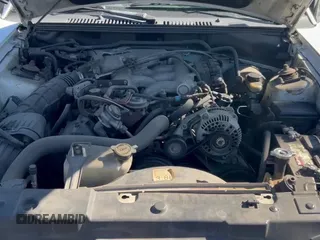 2000 Ford Mustang с VIN 1FAFP4447YF163897, выставлен на аукционе Copart как лот 91108345 с пробегом 120 765 миль миль и Чистый • Clean title. История ставок и продаж доступна на DreamBid. Изображение 11.