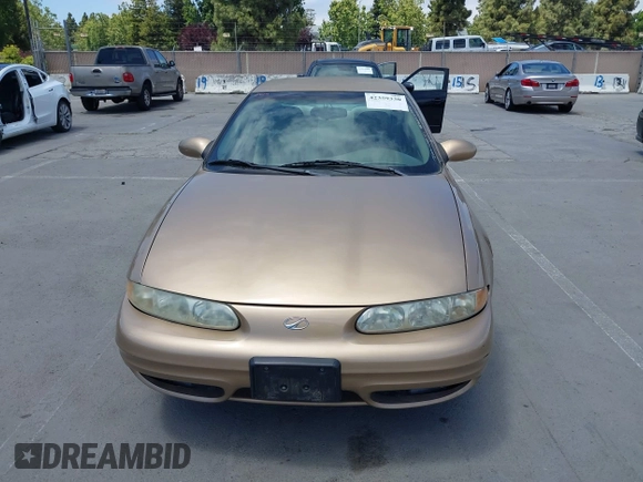 1999 Oldsmobile Alero GL z VIN 1G3NL52T1XC384073, wystawiony jako IAAI lot #42359330 z przebiegiem 177 869 mil mil oraz . Historia ofert i sprzedaży dostępna na DreamBid. Obrazek 12.