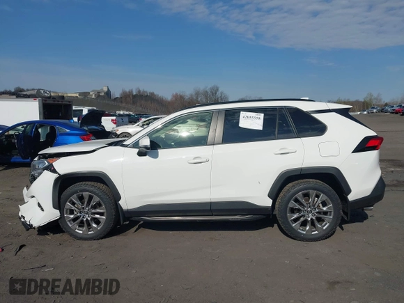 2019 Toyota RAV4 XLE Premium with VIN JTMA1RFV9KD013771, listed as a IAAI auction lot 42055558 with 36,585 mi miles. Bid and sale history available at carsss.com. Image 14.