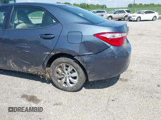2015 Toyota Corolla L z VIN 5YFBURHE5FP252830, wystawiony jako IAAI lot #42234851 z przebiegiem 132 237 mil mil oraz . Historia ofert i sprzedaży dostępna na DreamBid. Obrazek 6.