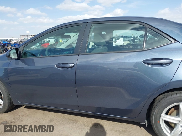 2018 Toyota Corolla L with VIN 5YFBURHEXJP806632, listed as a IAAI auction lot 41933984 with 70,091 mi miles and . Bid and sale history available at DreamBid. Image 15.