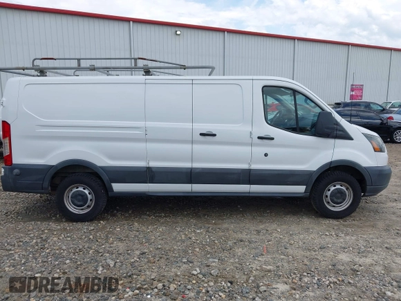 2016 Ford Transit Cargo z VIN 1FTYR2ZM9GKB01756, wystawiony jako IAAI lot #42469442 z przebiegiem 180 944 mil mil oraz . Historia ofert i sprzedaży dostępna na DreamBid. Obrazek 13.