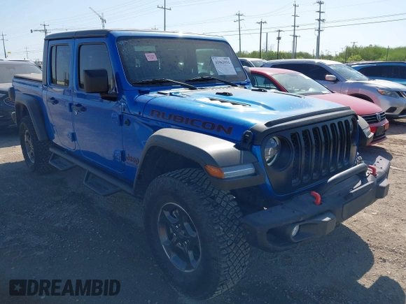 2023 Jeep Gladiator Rubicon with VIN 1C6JJTBG3PL581023, listed as a IAAI auction lot 41963931 with 15,023 mi miles and . Bid and sale history available at DreamBid. Image 1.