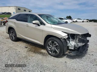 2018 Lexus RX 350L Premium with VIN JTJGZKCA9J2001848, listed as a Copart auction lot 61371135 with 60,459 mi miles and Salvage title. Bid and sale history available at DreamBid. Image 4.