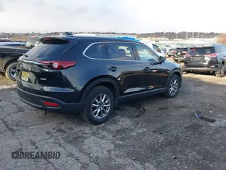 2017 Mazda CX-9 Touring with VIN JM3TCBCY5H0142400, listed as a IAAI auction lot 40987166 with 118,000 mi miles. Bid and sale history available at carsss.com. Image 4.