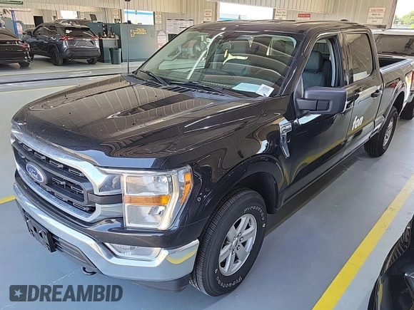 2021 Ford F-150 XL with VIN 1FTFW1E52MFB64744, listed as a IAAI auction lot 42733866 with 98,411 mi miles and . Bid and sale history available at DreamBid. Image 14.
