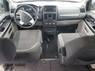 2009 Dodge Grand Caravan SE with VIN 2D8HN44E59R686851, listed as a Copart auction lot 48758335 with Not provided miles and Salvage title. Bid and sale history available at DreamBid. Image 8.