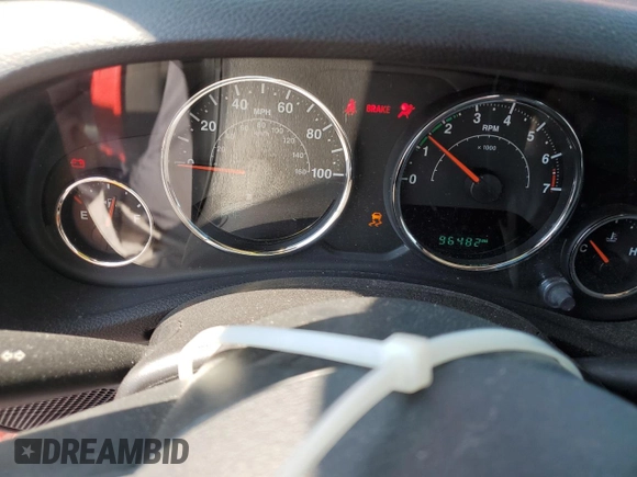 2015 Jeep Wrangler Unlimited Willys Wheeler with VIN 1C4BJWDG3FL726460, listed as a Copart auction lot 55827355 with 96,482 mi miles and Salvage Title. Bid and sale history available at DreamBid. Image 9.