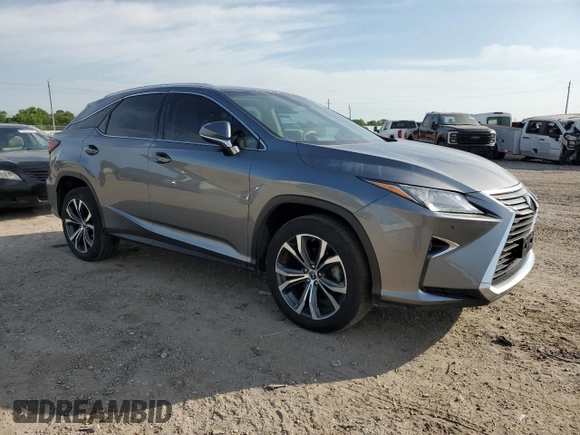 2019 Lexus RX 350 z VIN 2T2ZZMCA9KC129707, wystawiony jako Copart lot #52202615 z przebiegiem 69 868 mil mil oraz Szkoda całkowita • Salvage title. Historia ofert i sprzedaży dostępna na DreamBid. Obrazek 4.