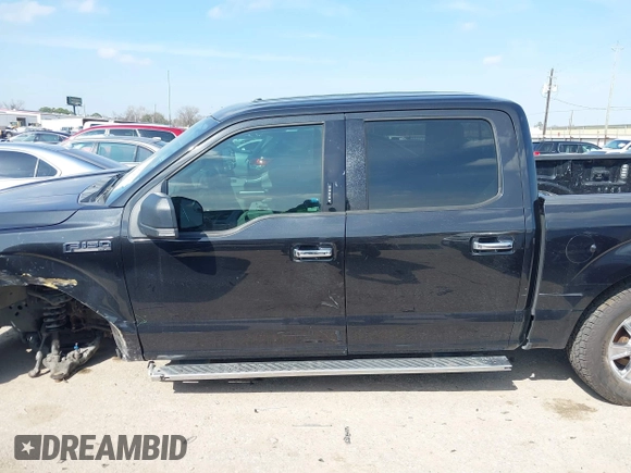 2015 Ford F-150 XLT with VIN 1FTEW1EF4FKD15422, listed as a IAAI auction lot 41593431 with 112,102 mi miles. Bid and sale history available at carsss.com. Image 14.