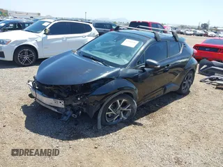 2018 Toyota C-HR XLE z VIN NMTKHMBX3JR024079, wystawiony jako IAAI lot #42110896 z przebiegiem 139 853 mil mil oraz . Historia ofert i sprzedaży dostępna na DreamBid. Obrazek 2.