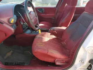1995 Chevrolet Corsica z VIN 1G1LD5548SY236130, wystawiony jako Copart lot #78059984 z przebiegiem 280 703 mil mil oraz Tytuł czysty. Historia ofert i sprzedaży dostępna na DreamBid. Obrazek 7.