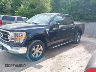 2021 Ford F-150 XL z VIN 1FTFW1E5XMFA57179, wystawiony jako IAAI lot #42561205 z przebiegiem 90 517 mil mil oraz . Historia ofert i sprzedaży dostępna na DreamBid. Obrazek 2.