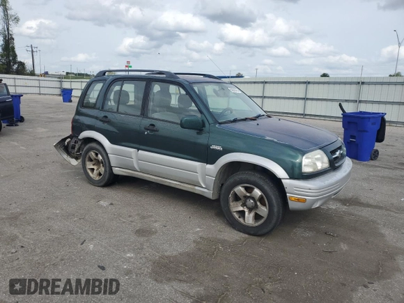 1999 Suzuki Grand Vitara JLX z VIN JS3TD62V0X4124366, wystawiony jako Copart lot #50885055 z przebiegiem 204 168 mil mil oraz Szkoda całkowita • Salvage title. Historia ofert i sprzedaży dostępna na DreamBid. Obrazek 4.