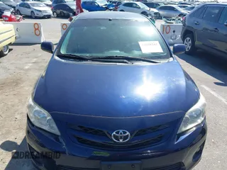 2012 Toyota Corolla L with VIN 2T1BU4EE3CC779137, listed as a IAAI auction lot 42008243 with 123,760 mi miles. Bid and sale history available at carsss.com. Image 13.