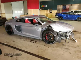 2018 Audi R8 V10 z VIN WUABAAFX7J7902267, wystawiony jako Copart lot #44403794 z przebiegiem Nie podano mil oraz Szkoda całkowita • Salvage title. Historia ofert i sprzedaży dostępna na DreamBid. Obrazek 4.