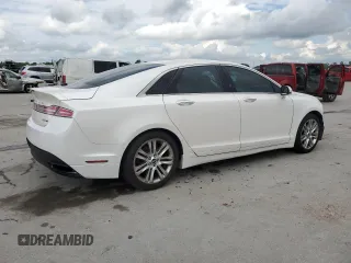 2015 Lincoln MKZ z VIN 3LN6L2J90FR601908, wystawiony jako Copart lot #55516355 z przebiegiem 127 487 mil mil oraz Szkoda całkowita • Salvage title. Historia ofert i sprzedaży dostępna na DreamBid. Obrazek 3.