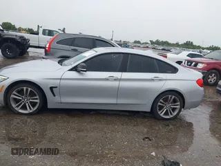 2015 BMW 4 Series 428i with VIN WBA4A9C50FD416459, listed as a IAAI auction lot 42471985 with 160,089 mi miles and . Bid and sale history available at DreamBid. Image 14.