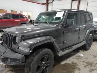 2020 Jeep Wrangler Unlimited Sahara with VIN 1C4HJXEN8LW293757, listed as a IAAI auction lot 41435340 with 28,385 mi miles. Bid and sale history available at carsss.com. Image 2.
