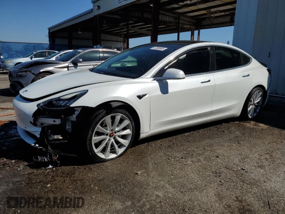 2020 Tesla Model 3 Standard Range Plus with VIN 5YJ3E1EA6LF661513, listed as a Copart auction lot 47008985 with 128,362 mi miles and Non Repairable. Bid and sale history available at DreamBid. Image 1.
