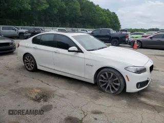 2016 BMW 5 Series 528i xDrive with VIN WBA5A7C5XGG148447, listed as a Copart auction lot 56825455 with 128,800 mi miles and Clean title. Bid and sale history available at DreamBid. Image 4.