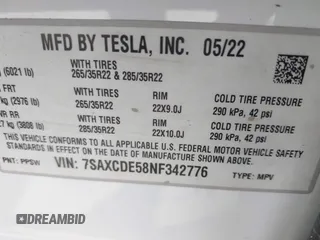 2022 Tesla Model X with VIN 7SAXCDE58NF342776, listed as a IAAI auction lot 42042369 with 70,301 mi miles and . Bid and sale history available at carsss.com. Image 9.