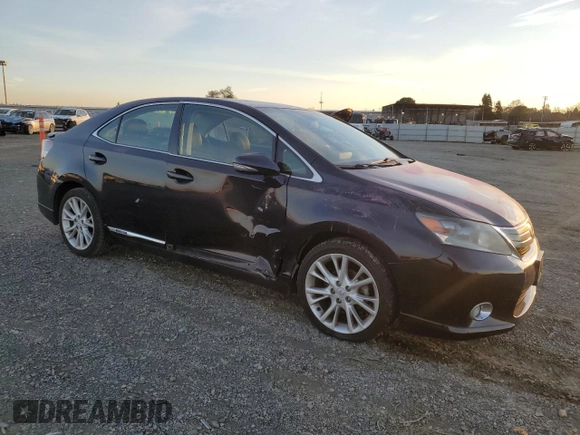 2010 Lexus HS 250h with VIN JTHBB1BA1A2001161, listed as a Copart auction lot 87281574 with 88,808 mi miles and Salvage Title. Bid and sale history available at DreamBid. Image 4.