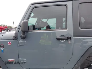 2013 Jeep Wrangler Rubicon 10th Anniversary with VIN 1C4BJWCG2DL651815, listed as a IAAI auction lot 41643919 with 98,297 mi miles and . Bid and sale history available at DreamBid. Image 14.