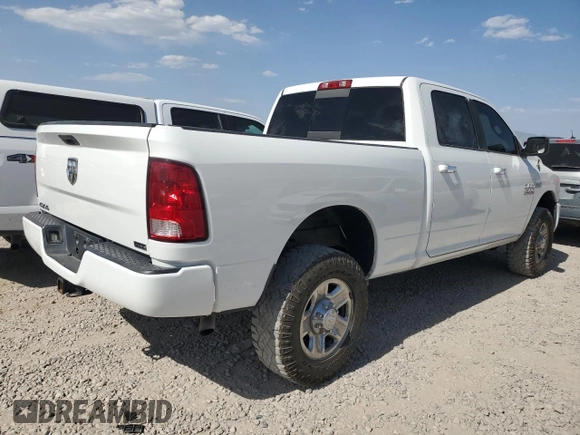 2014 Ram 2500 SLT with VIN 3C6TR5DT7EG217625, listed as a Copart auction lot 61656495 with 133,049 mi miles and Clean title. Bid and sale history available at DreamBid. Image 3.