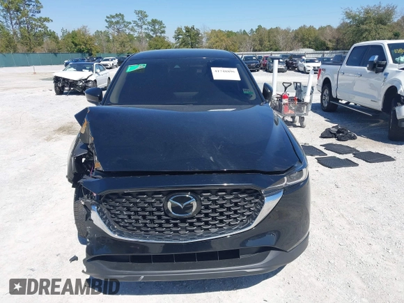 2023 Mazda CX-5 2.5 S with VIN JM3KFBAM3P0244974, listed as a IAAI auction lot 41748896 with 21,387 mi miles. Bid and sale history available at carsss.com. Image 12.
