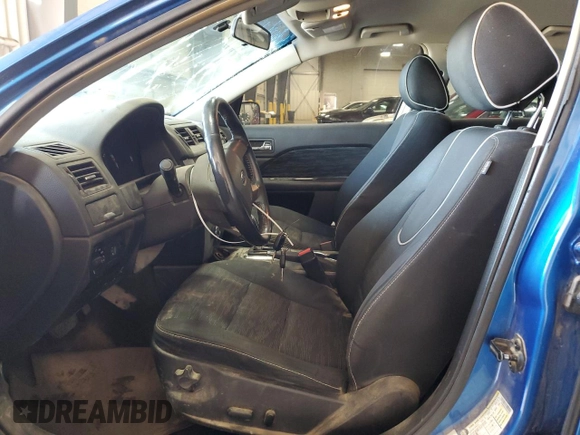 2012 Ford Fusion SE with VIN 3FAHP0HA3CR325781, listed as a Copart auction lot 52038025 with 134,349 mi miles and Salvage Title. Bid and sale history available at DreamBid. Image 7.