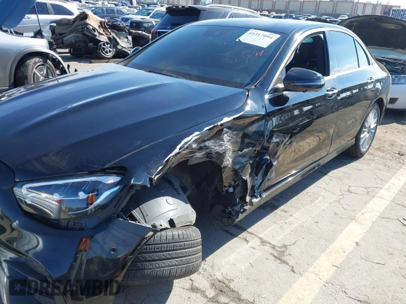 2021 Mercedes-Benz E-Class E 350 with VIN W1KZF8DB0MA889890, listed as a IAAI auction lot 41317094 with 63,075 mi miles. Bid and sale history available at carsss.com. Image 2.
