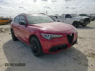 2019 Alfa Romeo Stelvio Ti z VIN ZASPAKBN8K7C69851, wystawiony jako Copart lot #49490875 z przebiegiem Nie podano mil oraz Szkody całkowita. Historia ofert i sprzedaży dostępna na DreamBid. Obrazek 12.