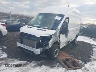 2023 Ford Transit Cargo with VIN 1FTBW1X83PKC09336, listed as a IAAI auction lot 41299101 with 10,551 mi miles and . Bid and sale history available at DreamBid. Image 2.