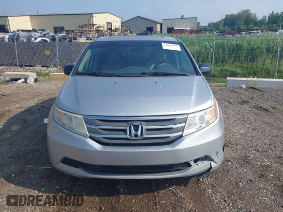 2012 Honda Odyssey EX-L with VIN 5FNRL5H65CB039015, listed as a IAAI auction lot 42612886 with 216,955 mi miles and . Bid and sale history available at DreamBid. Image 12.