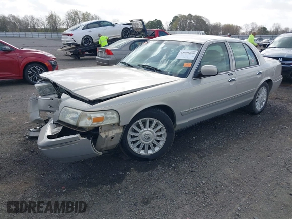 2008 Mercury Grand Marquis LS z VIN 2MEFM75V78X657966, wystawiony jako IAAI lot #41802080 z przebiegiem 113 846 mil mil oraz . Historia ofert i sprzedaży dostępna na DreamBid. Obrazek 2.