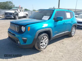 2020 Jeep Renegade Latitude with VIN ZACNJAB10LPM09870, listed as a IAAI auction lot 42063390 with 59,201 mi miles. Bid and sale history available at carsss.com. Image 2.