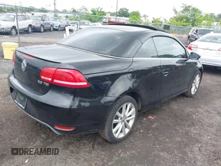 2014 Volkswagen Eos Sport with VIN WVWBW8AH2EV003356, listed as a IAAI auction lot 42394312 with 70,448 mi miles and . Bid and sale history available at DreamBid. Image 4.