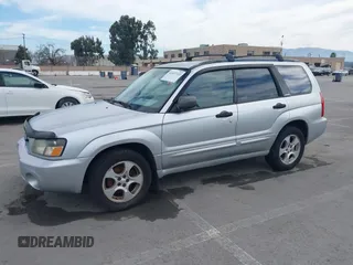2003 Subaru Forester XS with VIN JF1SG65633H714866, listed as a IAAI auction lot 41697132 with 162,447 mi miles. Bid and sale history available at carsss.com. Image 2.