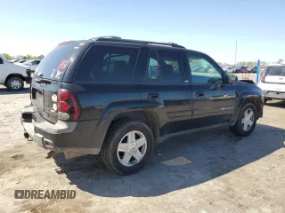 2002 Chevrolet TrailBlazer LTZ with VIN 1GNDT13S322212983, listed as a Copart auction lot 53608405 with 107,187 mi miles and Salvage Title. Bid and sale history available at DreamBid. Image 3.