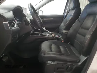 2021 Mazda CX-5 Grand Touring with VIN JM3KFBDM4M1344602, listed as a Copart auction lot 82793724 with 69,322 mi miles and Salvage Title. Bid and sale history available at carsss.com. Image 7.