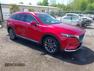 2020 Mazda CX-9 Signature with VIN JM3TCBEY4L0413789, listed as a IAAI auction lot 42097188 with 102,541 mi miles and . Bid and sale history available at carsss.com. Image 1.